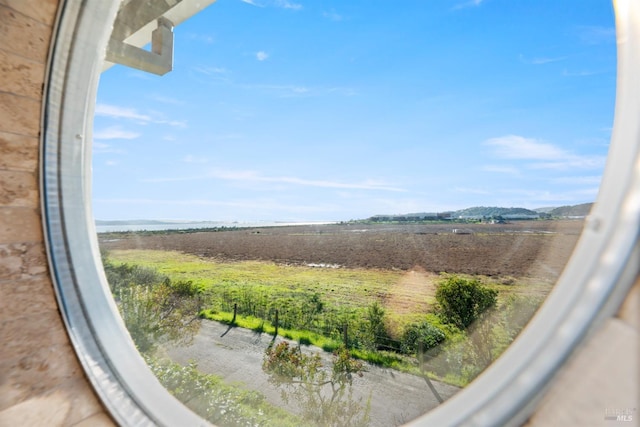 exterior space with a rural view