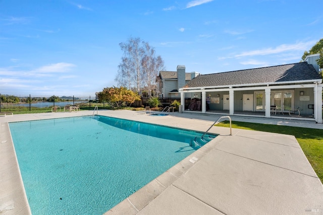 view of pool featuring a patio