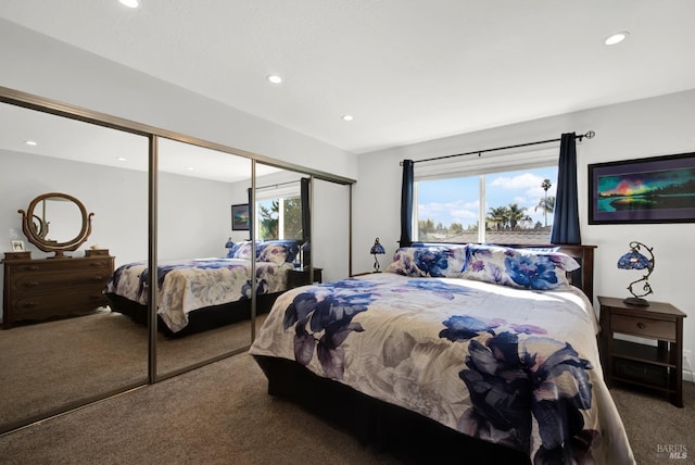 carpeted bedroom with a closet