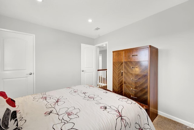 bedroom featuring carpet