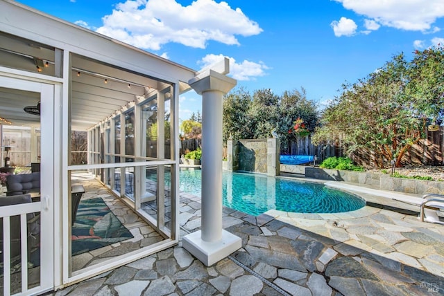 view of swimming pool featuring a patio