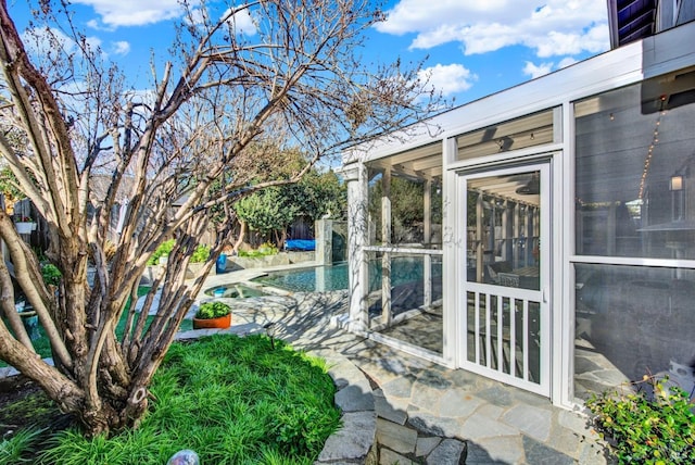 exterior space with a sunroom