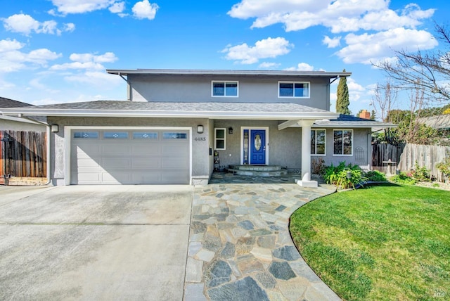 front of property featuring a garage, covered porch, and a front lawn