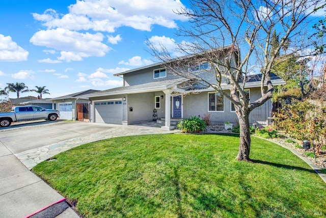 view of front property with a garage and a front yard