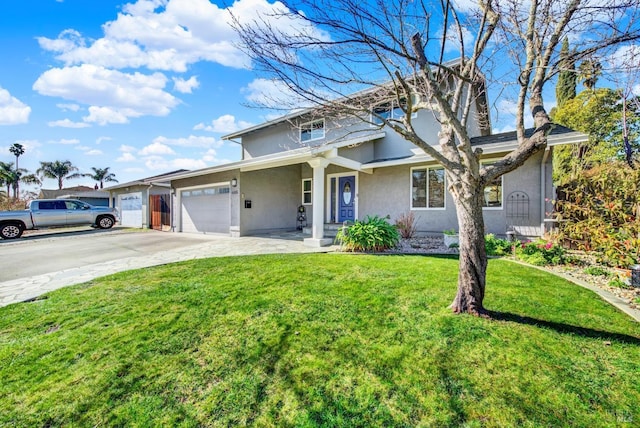 front of property with a garage and a front lawn