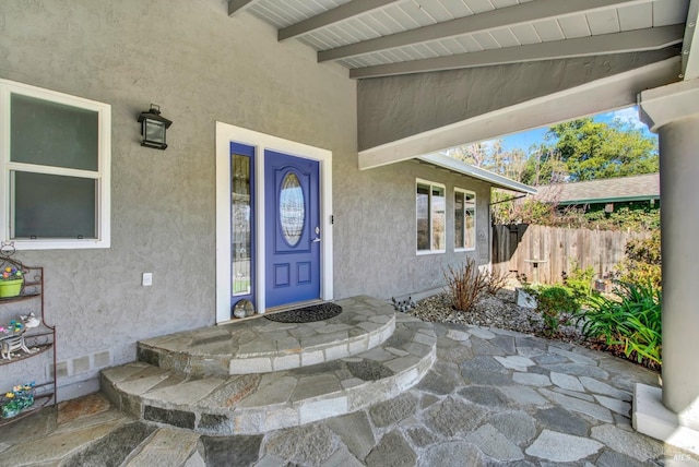 doorway to property featuring a patio