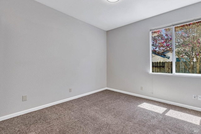 view of carpeted spare room