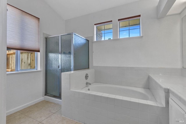 bathroom featuring vanity, tile patterned floors, and shower with separate bathtub