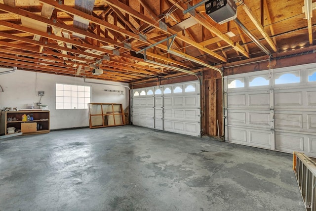 garage featuring a garage door opener