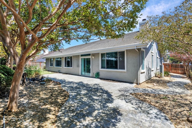 back of house featuring a patio area