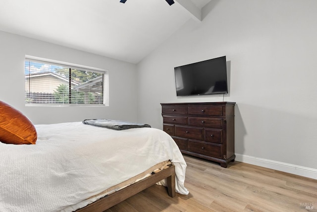 bedroom featuring lofted ceiling, ceiling fan, and light hardwood / wood-style flooring