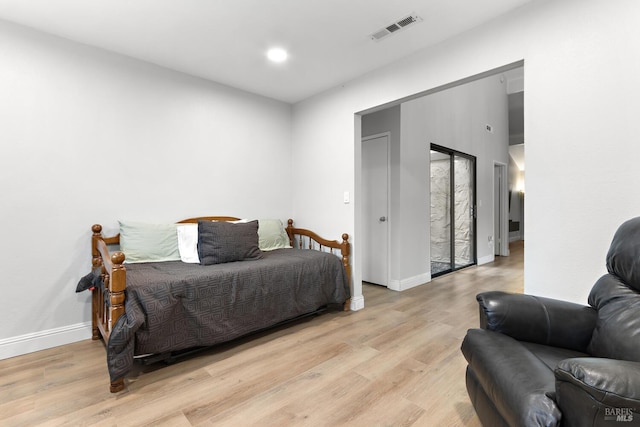 bedroom featuring light hardwood / wood-style flooring