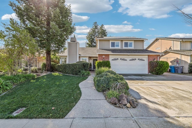 front of property with a garage and a front yard