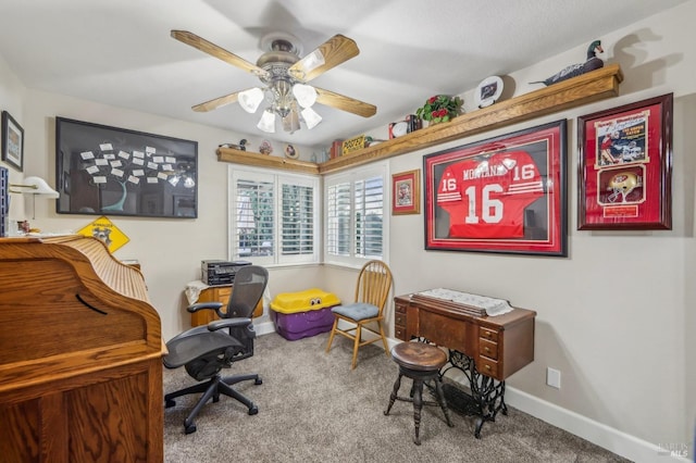 home office featuring carpet and ceiling fan