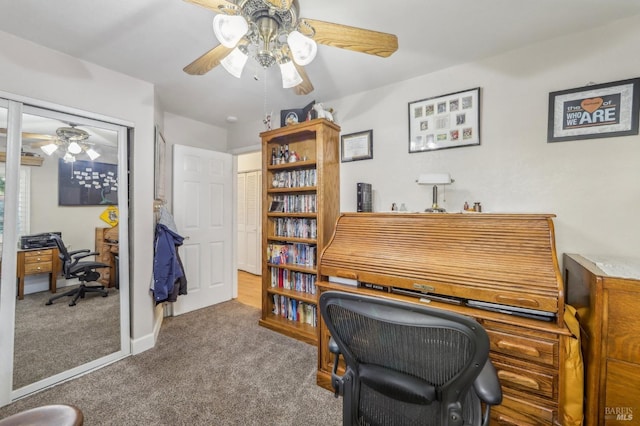 office space with ceiling fan and carpet flooring