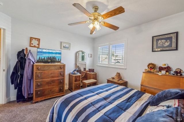 bedroom featuring ceiling fan and carpet flooring