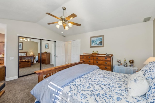 carpeted bedroom with vaulted ceiling and ceiling fan