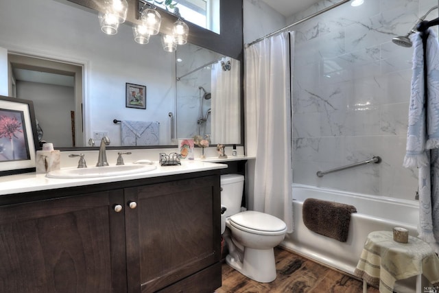 full bathroom with shower / tub combo with curtain, vanity, hardwood / wood-style flooring, and toilet