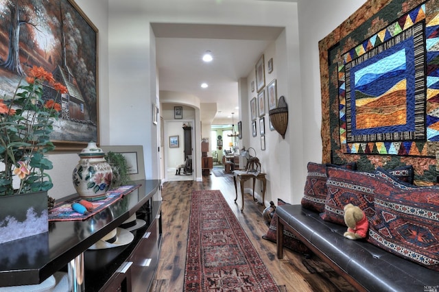 hallway featuring wood-type flooring