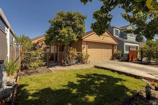 view of front facade featuring a garage and a front lawn