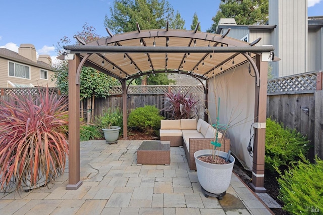 view of patio with outdoor lounge area, a fenced backyard, and a pergola