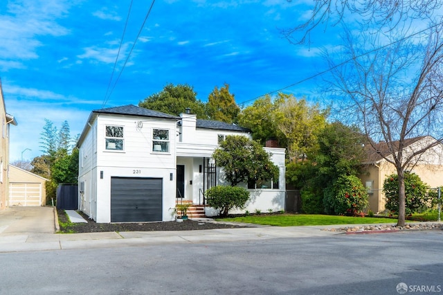 view of front of property featuring fence and stucco siding