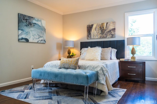 bedroom with ornamental molding, dark wood-type flooring, and baseboards