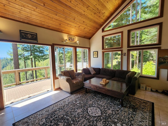 living room featuring a wealth of natural light, wood ceiling, and light tile patterned flooring