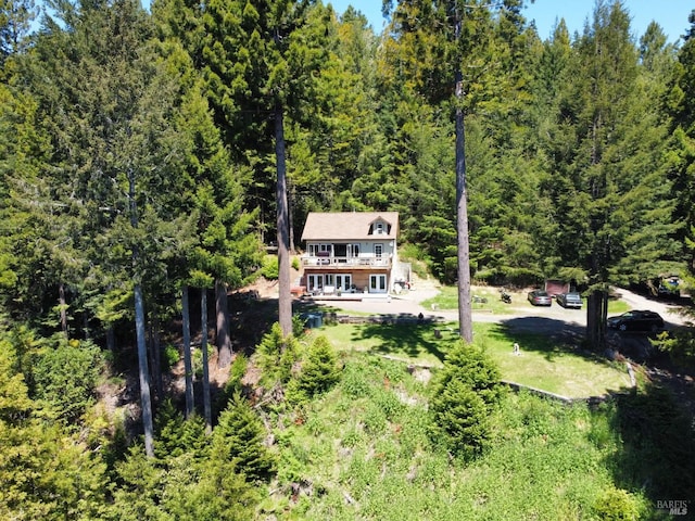 drone / aerial view with a forest view