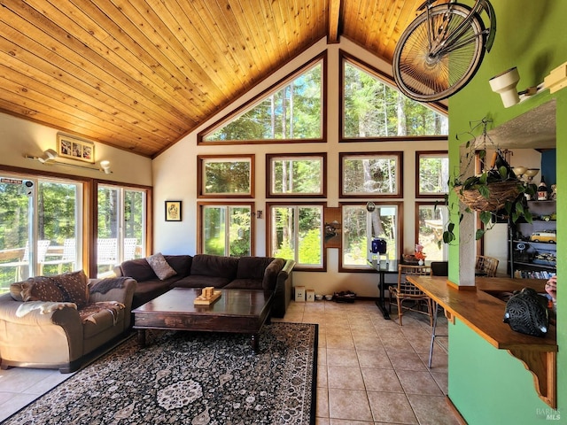 living room with a healthy amount of sunlight, light tile patterned floors, and wooden ceiling