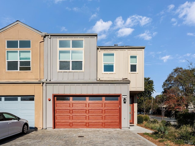 view of front of property with a garage