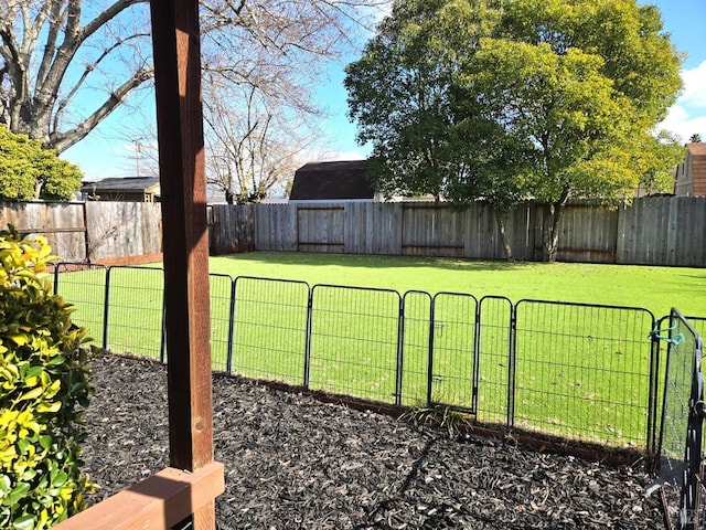 view of yard featuring a fenced backyard