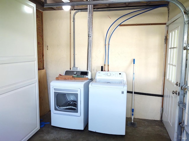 laundry room with independent washer and dryer