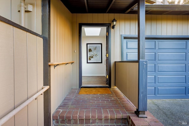 doorway to property featuring a garage