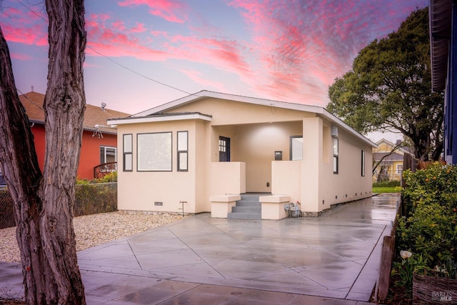 view of front of house featuring a patio