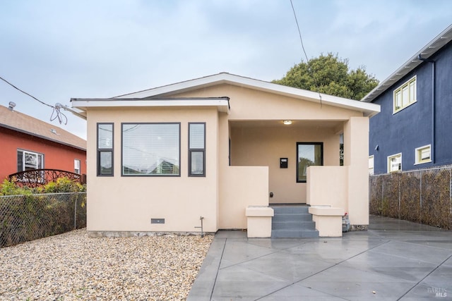 view of front of property with a patio area