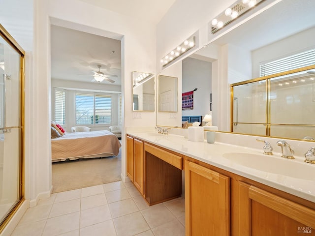 bathroom featuring vanity, tile patterned floors, ceiling fan, and a shower with shower door