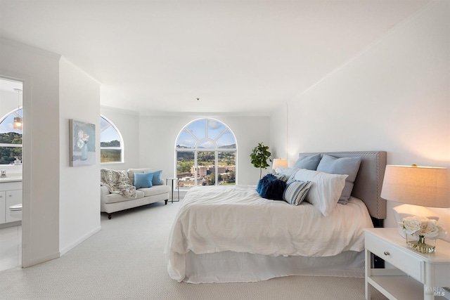 carpeted bedroom with ornamental molding