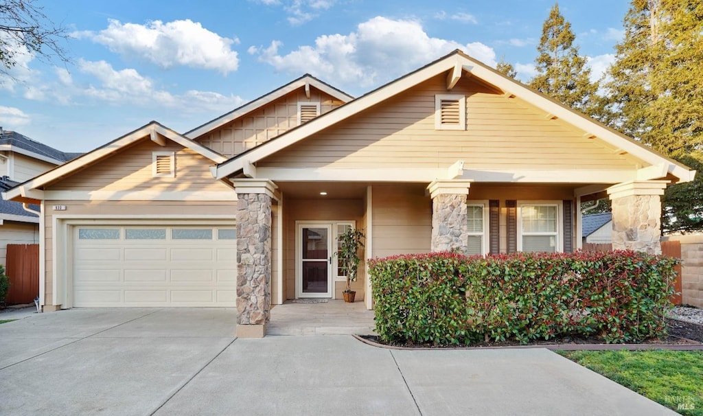 view of front of property with a garage