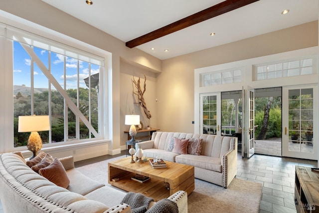 living room with beam ceiling