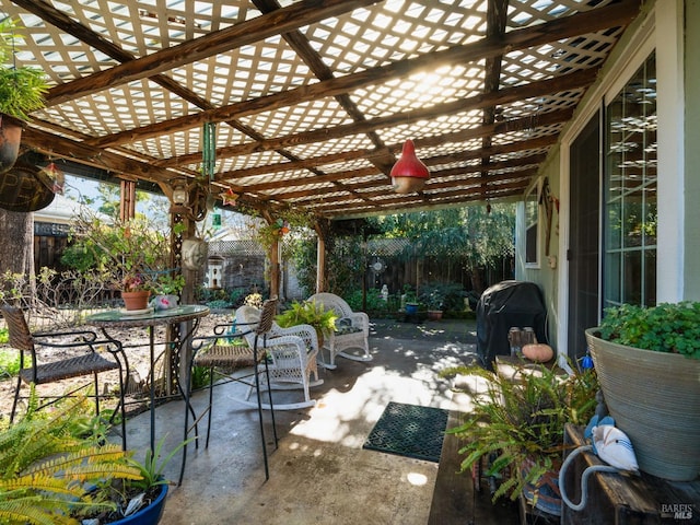 view of patio / terrace with a pergola and grilling area