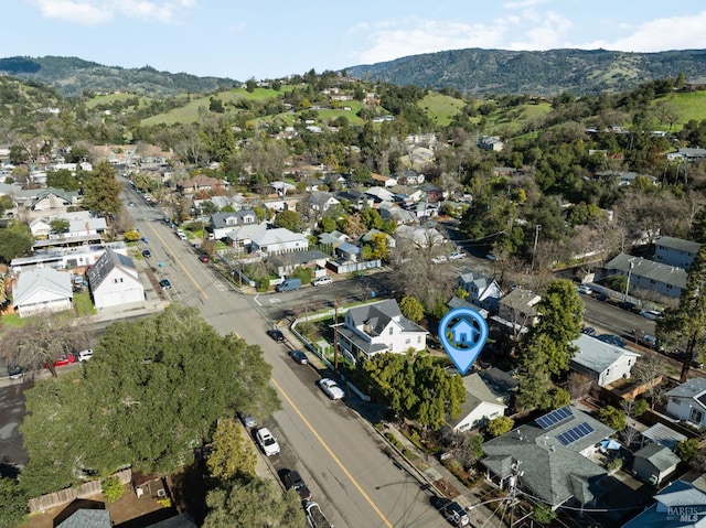 drone / aerial view featuring a mountain view