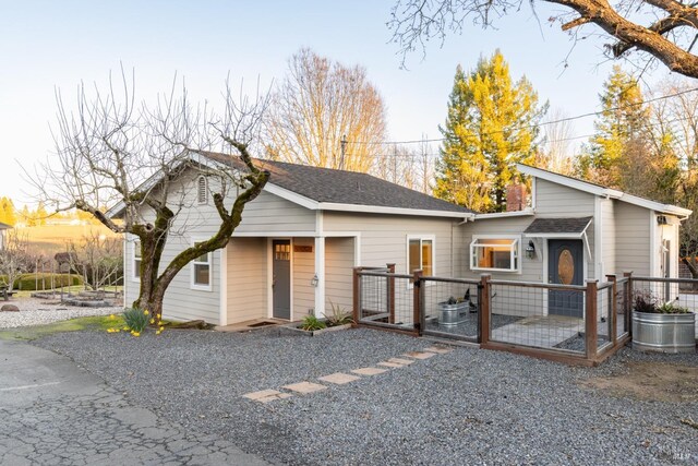 birds eye view of property with a rural view