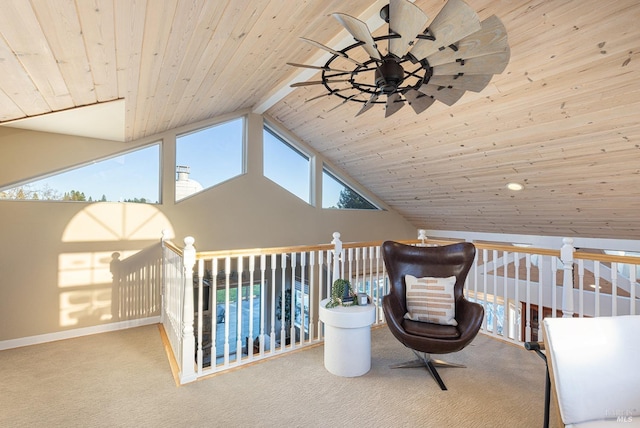 unfurnished room with carpet, wood ceiling, baseboards, and beam ceiling