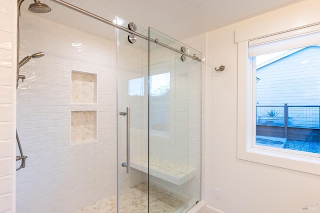 bathroom featuring a stall shower