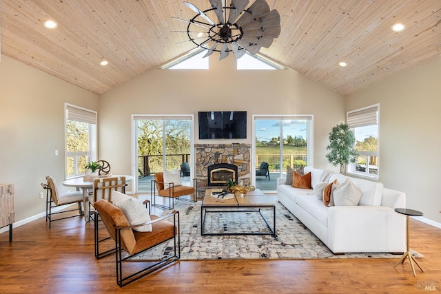 living room featuring high vaulted ceiling, wooden ceiling, wood finished floors, and a ceiling fan