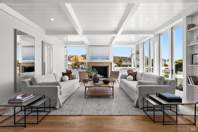 sunroom with beamed ceiling