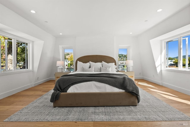 bedroom with light wood-type flooring