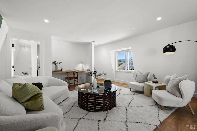 living room with light hardwood / wood-style floors