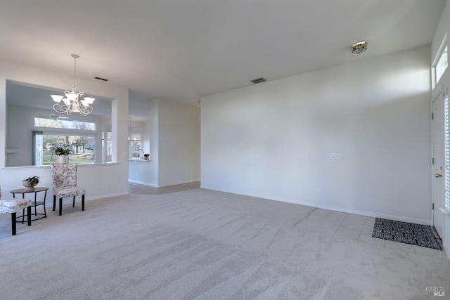 interior space featuring a chandelier